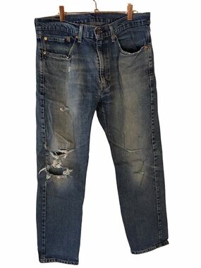 Levi 502 Distressed Taper Jeans